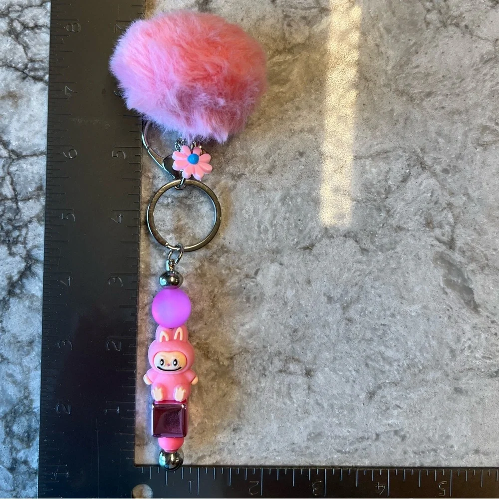 Pink Silicone Labubu Keychain with Pom Pom and Floral Accent - Picture 2 of 8